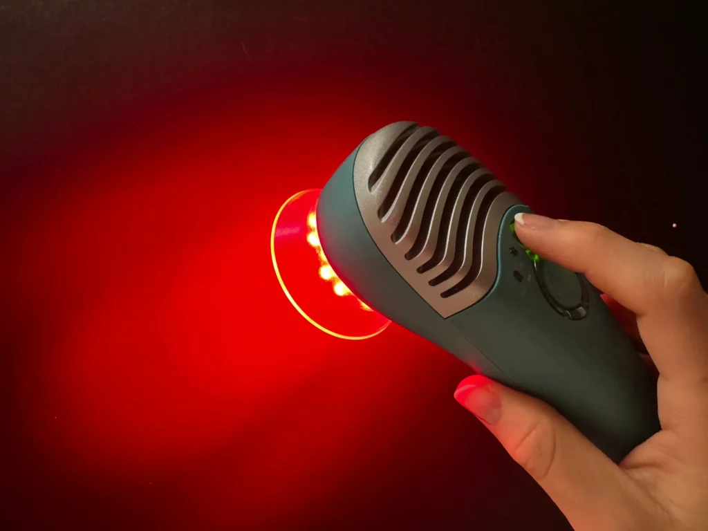 Luma with spacer in hand, shining red light