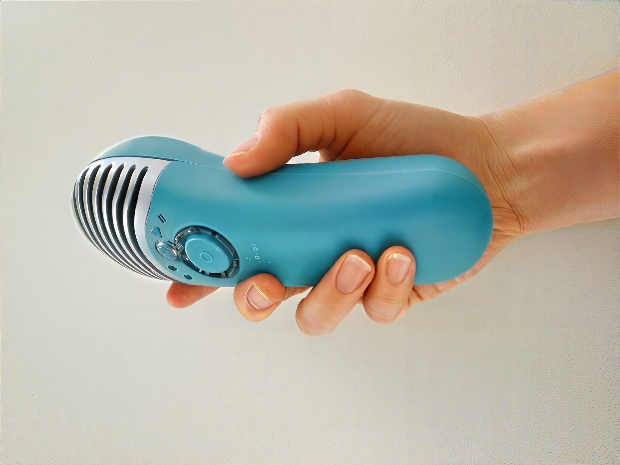 A dog undergoing red light therapy for paw licking issues.